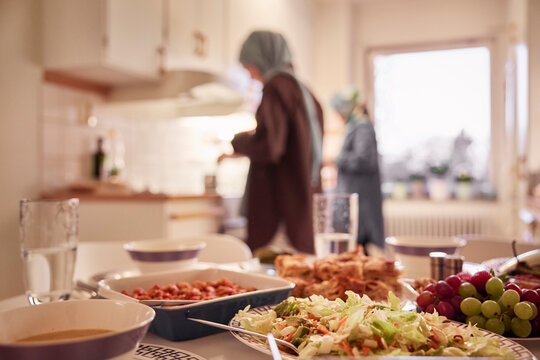 Women preparing eid al-fitr at home