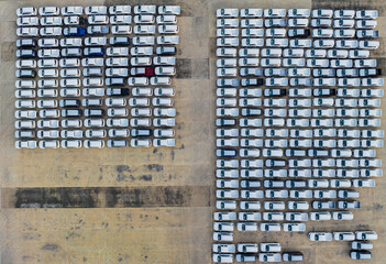 Aerial view new cars parking for sale stock lot row, New cars dealer inventory import export business commercial global, Business automobile and automotive industry.