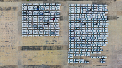 Aerial view new cars parking for sale stock lot row, New cars dealer inventory import export business commercial global, Business automobile and automotive industry.