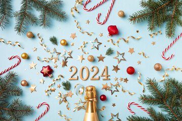 Christmas and New Year composition with golden champagne bottle, 2024 numbers, fir tree, party...