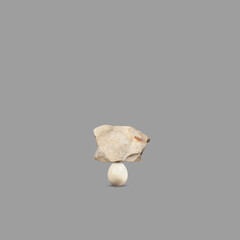 Marble Stone and Egg. Stamina, Endurance, Physical and Mental Strength. Creative Concept. Minimal Aesthetic.