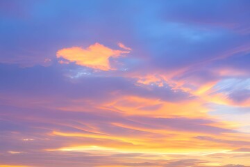 Naklejka na ściany i meble 青い空に映るピンクとオレンジの雲、朝焼けの空が見せる素晴らしい光景、新たな一日への期待が高まる瞬間