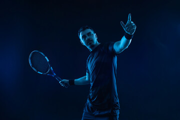 Tennis player banner on the black background Photo for sports tenis designs. - obrazy, fototapety, plakaty