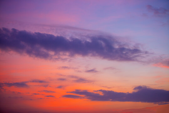 morning clouds and sky,Real majestic sunrise sundown sky background with gentle colorful clouds without birds. Panoramic, big size © banjongseal324