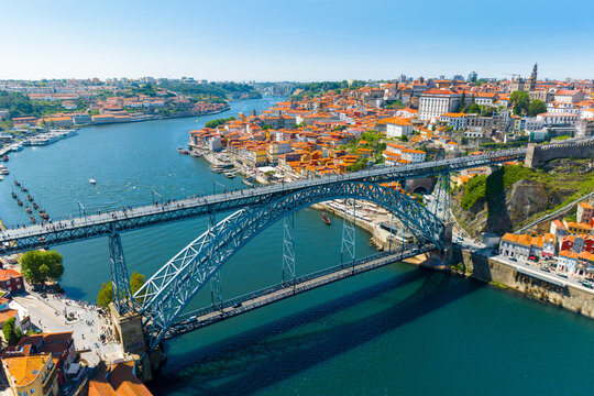 Famous bridge Ponte dom Luis above old town of Porto at river Duoro, Portugal