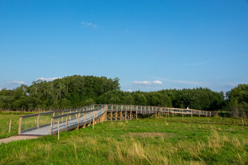 Fototapeta na wymiar The municipal nature reserve Stadssjön is a green oasis in Hedemora