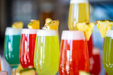 Colorful cocktails with pineapple.
