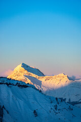 Mont Charvin, Mountain in the french alps covered with fresh snow, in winter. Megève, Haute-Savoie, France - obrazy, fototapety, plakaty