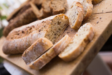 Fresh loaf of bread on wooden board