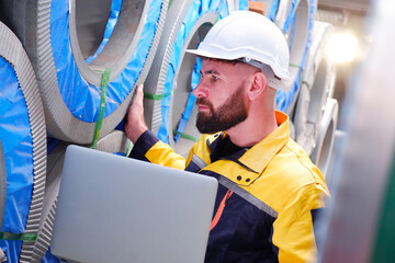 Engineer inspects machinery and equipment Maintenance of machinery in the factory.
