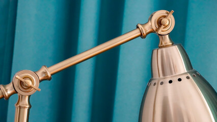 A vintage-looking gold bedside lamp