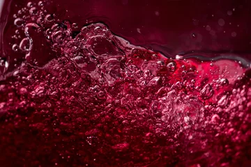 Fotobehang Abstract splashing of red wine. © Igor Normann