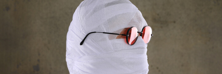 portrait of a mummy in white bandages