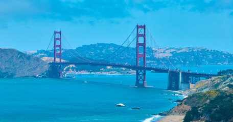 Sunny view Golden Gate Bridge aerial with hazy quality, San Francisco, CA