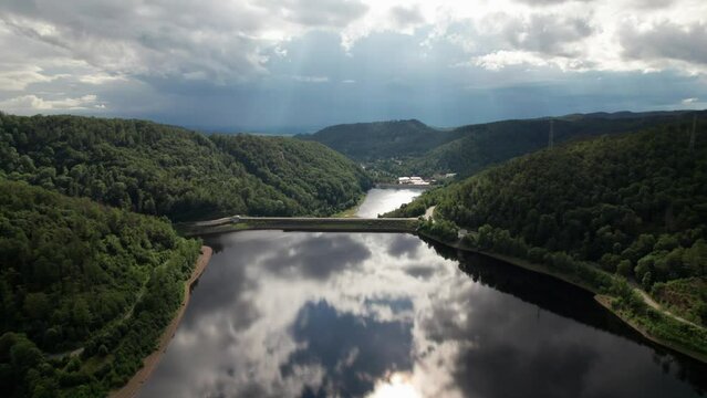 Aerial drone video of flight over the lake in Bad Lauterberg Germany.