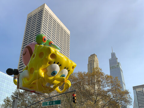 The 95th Annual Macy's Thanksgiving Day Parade SpongeBob SquarePants and Gary balloon viewed from Bryant Park