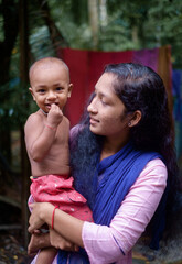 Portrait of a south asian young auntie with her little nephew