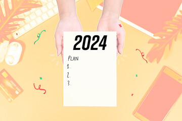 2024 new year with new goals with hand and paper for writing plan collage art design - obrazy, fototapety, plakaty