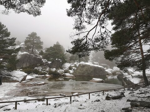 The snowy black lagoon in the Urbi&oacute;n mountain range, Soria
