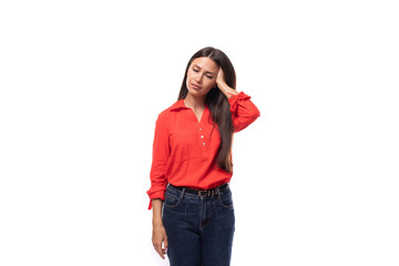 portrait of a charming young model woman with straight black hair dressed in a red blouse tucked into trousers - Powered by Adobe