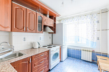 interior apartment kitchen and dining room, refectory area, cooking equipment, table furniture, stove