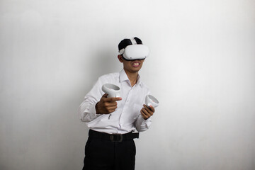 A man wearing a white shirt and black trousers who uses VR (Virtual Reality) technology happily....