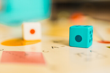 Board game with dice closeup. Play games concept.  - obrazy, fototapety, plakaty