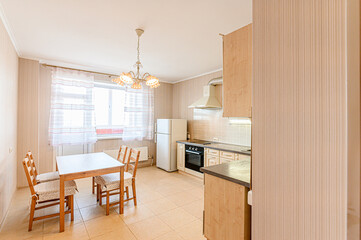 interior apartment kitchen and dining room, refectory area, cooking equipment, table furniture, stove