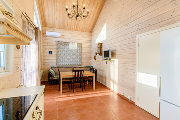 interior apartment kitchen and dining room, refectory area, cooking equipment, table furniture, stove