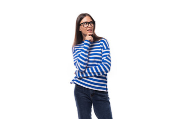 well-groomed young slender caucasian woman with chic hair and make-up in glasses. people lightstyle concept