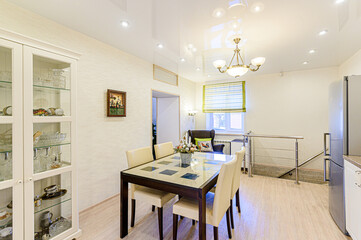 interior apartment kitchen and dining room, refectory area, cooking equipment, table furniture, stove