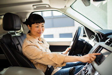 Confident Woman Driving a Car