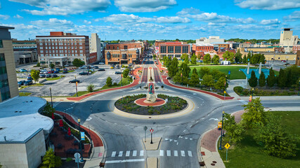 Passing of the Buffalo statue beside Canan Commons Park aerial of city on gorgeous day, Muncie IN - obrazy, fototapety, plakaty