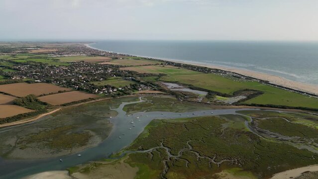 West Wittering Beach Early Evening  fly over march area Aerial View Drone shot