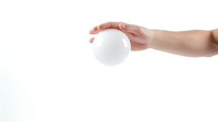 Hand holding a ball in balance, isolated on a white background 