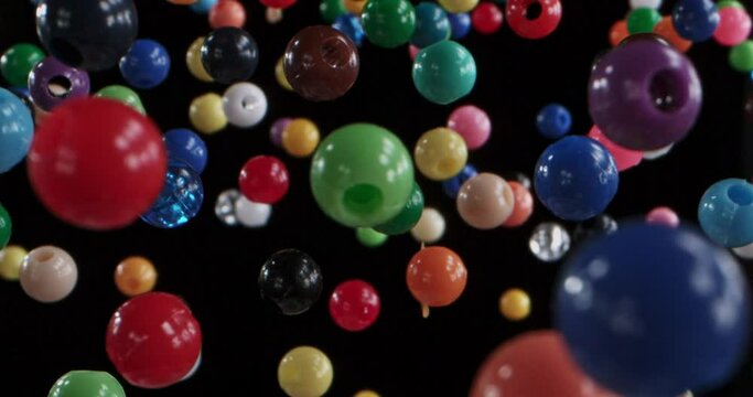 multi colored beads in the air