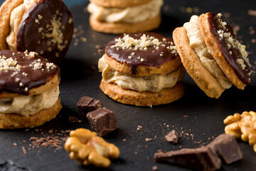 Round nut cookies with coffee and nut cream