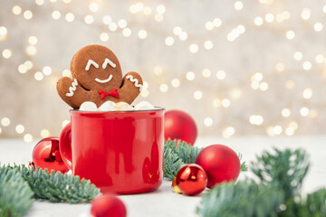 Gingerbread cookie man in a hot chocolate.