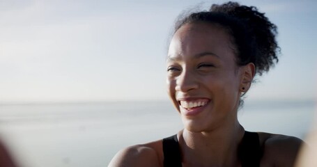 Selfie, smile and woman face with laughing and fitness on the beach for social media and picture. Happy, female athlete and outdoor by the sea with exercise and workout with training and freedom