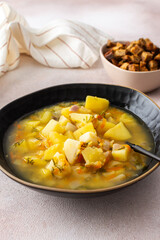Pea soup with fried croutons, healthy bean soup