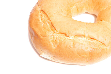 Fresh wheat round white bread bagel isolated on white background, top view