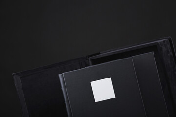 Two beautiful leather black bound books in box with soft fabric. Wedding photo book, family album....