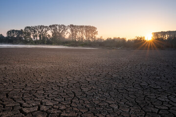 Dry cracked earth in Salburua park, Vitoria-Gasteiz (Spain) - 681642057
