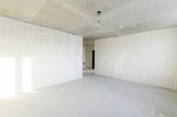 interior apartment rough repair for self-finishing. interior decoration, bare walls of the room, stage of construction