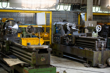 Background of old machine in the manufacturing factory. Metalworking industry.