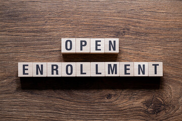 Open enrollment - word concept on building blocks, text