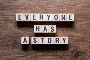 Everyone has a story - word concept on building blocks, text