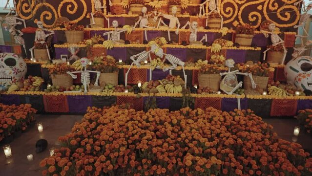 Day of The Dead Dia de los Muertos Ofrenda Altar Display Decoration with Sugar Skull Calavera and Marigolds Oaxaca, Mexico