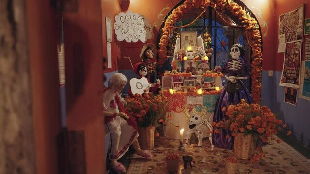 Day of The Dead Dia de los Muertos Ofrenda Altar Display Decoration with Sugar Skull Calavera and Marigolds Oaxaca, Mexico