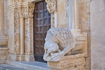 Detailed view of ornate stone carvings of the Church of San Leonardo in Manfredonia, Italy